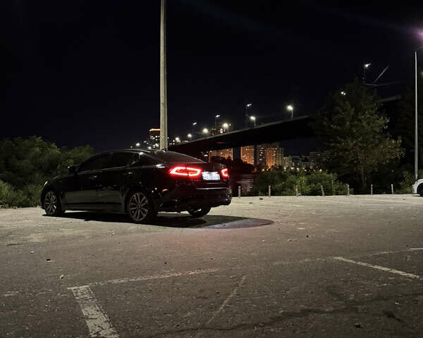 Чорний Кіа Оптіма, об'ємом двигуна 2 л та пробігом 174 тис. км за 12000 $, фото 9 на Automoto.ua