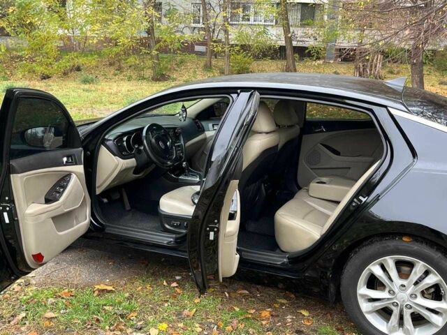 Черный Киа Оптима, объемом двигателя 2.4 л и пробегом 240 тыс. км за 9500 $, фото 4 на Automoto.ua