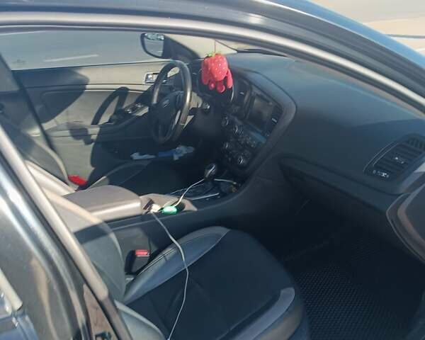 Чорний Кіа Оптіма, об'ємом двигуна 2.36 л та пробігом 409 тис. км за 7200 $, фото 11 на Automoto.ua