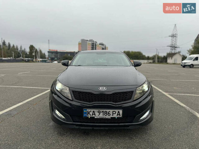 Черный Киа Оптима, объемом двигателя 2.36 л и пробегом 252 тыс. км за 11000 $, фото 2 на Automoto.ua