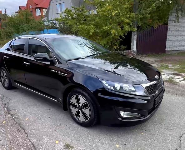 Черный Киа Оптима, объемом двигателя 2.4 л и пробегом 252 тыс. км за 10000 $, фото 3 на Automoto.ua