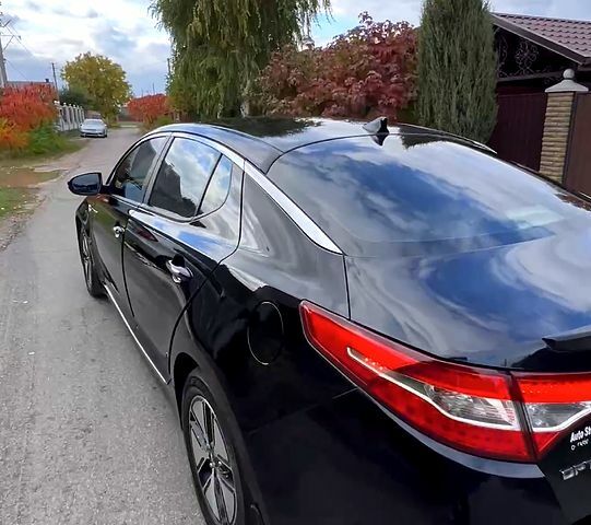 Черный Киа Оптима, объемом двигателя 2.4 л и пробегом 252 тыс. км за 10000 $, фото 4 на Automoto.ua