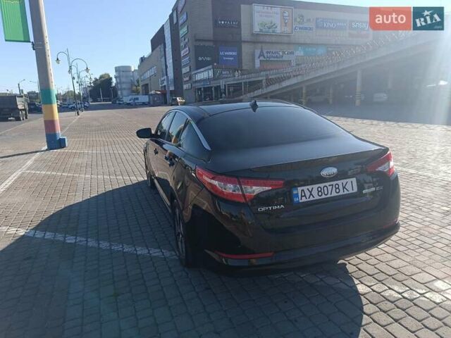 Чорний Кіа Оптіма, об'ємом двигуна 2.36 л та пробігом 409 тис. км за 7200 $, фото 3 на Automoto.ua
