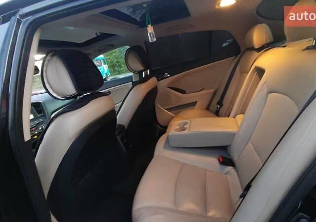 Черный Киа Оптима, объемом двигателя 2.36 л и пробегом 182 тыс. км за 11300 $, фото 2 на Automoto.ua