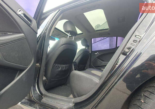 Черный Киа Оптима, объемом двигателя 2.36 л и пробегом 300 тыс. км за 7400 $, фото 6 на Automoto.ua