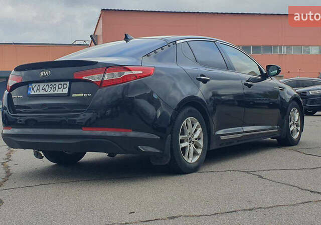 Черный Киа Оптима, объемом двигателя 2.36 л и пробегом 300 тыс. км за 7400 $, фото 1 на Automoto.ua