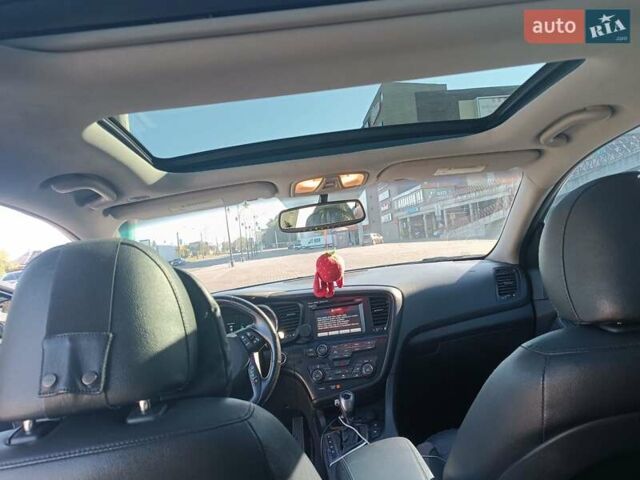 Чорний Кіа Оптіма, об'ємом двигуна 2.36 л та пробігом 409 тис. км за 7200 $, фото 14 на Automoto.ua
