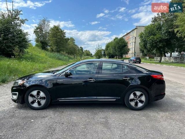 Черный Киа Оптима, объемом двигателя 2.36 л и пробегом 229 тыс. км за 10400 $, фото 12 на Automoto.ua