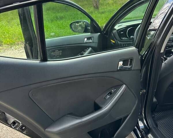Черный Киа Оптима, объемом двигателя 2.36 л и пробегом 229 тыс. км за 10400 $, фото 21 на Automoto.ua