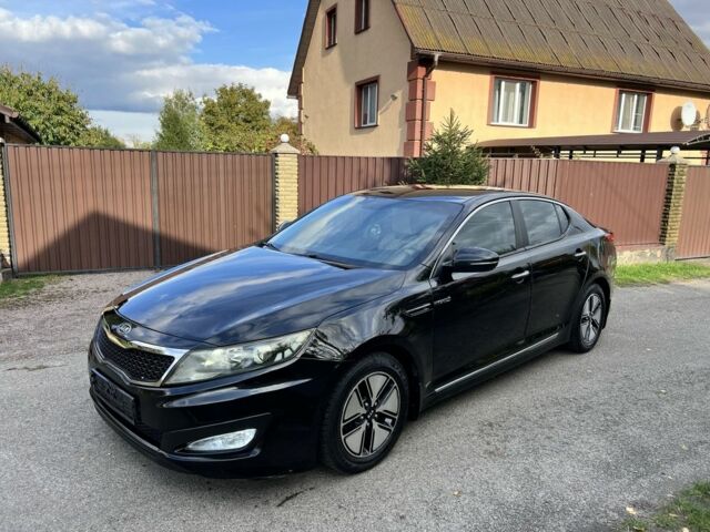 Чорний Кіа Оптіма, об'ємом двигуна 2.4 л та пробігом 250 тис. км за 8999 $, фото 1 на Automoto.ua