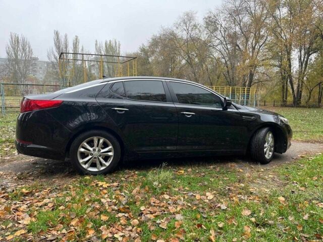 Черный Киа Оптима, объемом двигателя 2.4 л и пробегом 240 тыс. км за 9500 $, фото 1 на Automoto.ua