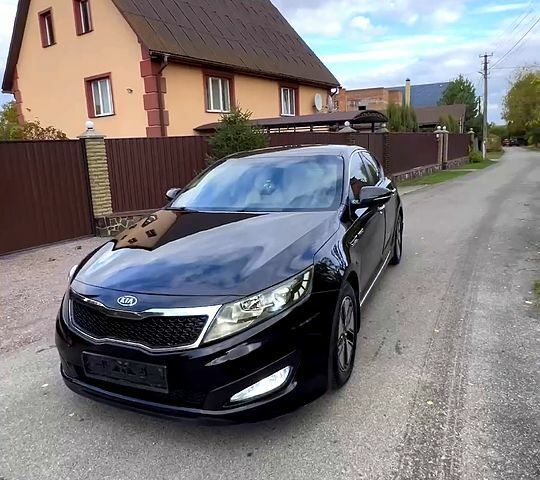Черный Киа Оптима, объемом двигателя 2.4 л и пробегом 252 тыс. км за 10000 $, фото 2 на Automoto.ua