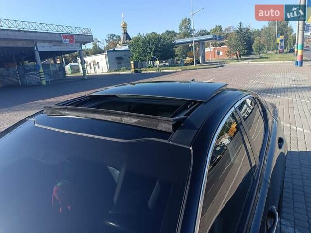 Чорний Кіа Оптіма, об'ємом двигуна 2.36 л та пробігом 409 тис. км за 7200 $, фото 16 на Automoto.ua