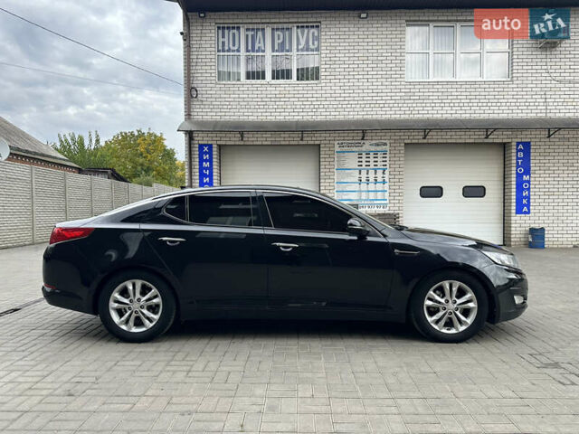 Черный Киа Оптима, объемом двигателя 2.36 л и пробегом 230 тыс. км за 8200 $, фото 5 на Automoto.ua