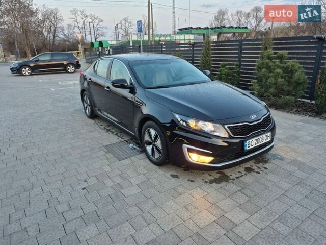Черный Киа Оптима, объемом двигателя 2.36 л и пробегом 251 тыс. км за 9750 $, фото 1 на Automoto.ua