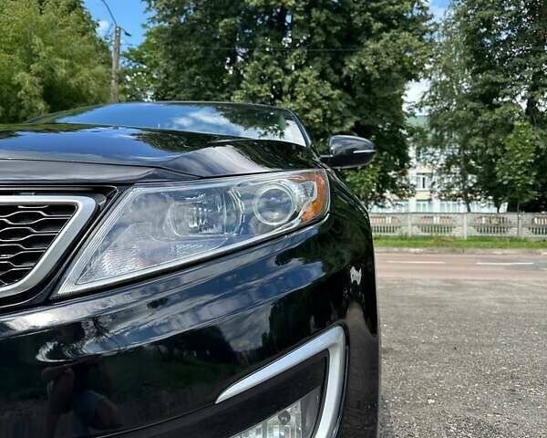Черный Киа Оптима, объемом двигателя 2.36 л и пробегом 229 тыс. км за 10400 $, фото 6 на Automoto.ua