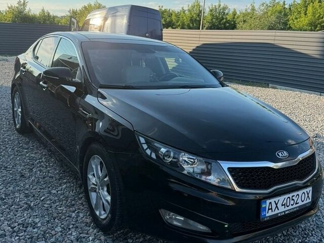 Чорний Кіа Оптіма, об'ємом двигуна 2.36 л та пробігом 240 тис. км за 8500 $, фото 1 на Automoto.ua