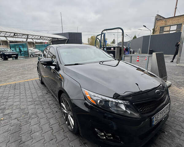 Чорний Кіа Оптіма, об'ємом двигуна 2 л та пробігом 174 тис. км за 12000 $, фото 2 на Automoto.ua