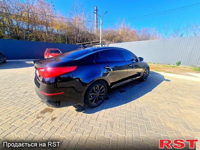 Чорний Кіа Оптіма, об'ємом двигуна 2.4 л та пробігом 210 тис. км за 9000 $, фото 1 на Automoto.ua