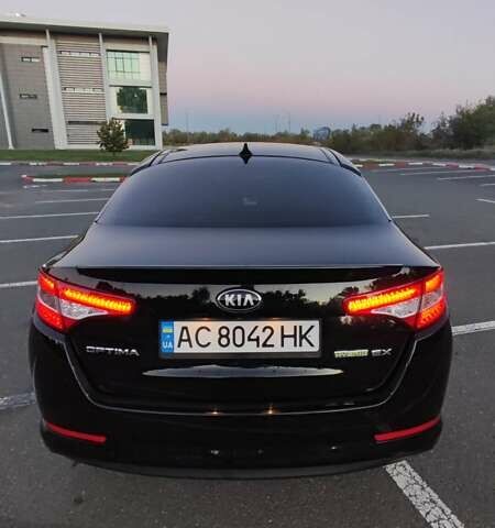 Черный Киа Оптима, объемом двигателя 2.36 л и пробегом 182 тыс. км за 11300 $, фото 3 на Automoto.ua