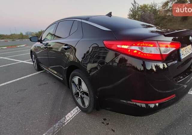 Черный Киа Оптима, объемом двигателя 2.36 л и пробегом 182 тыс. км за 11300 $, фото 6 на Automoto.ua