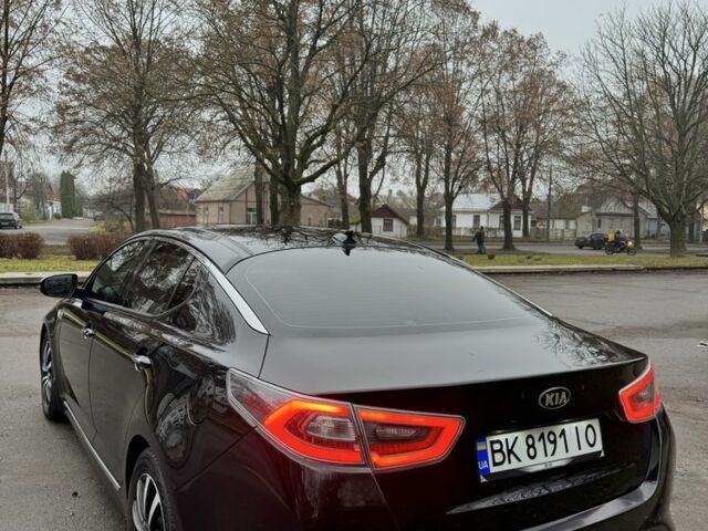 Чорний Кіа Оптіма, об'ємом двигуна 2.4 л та пробігом 168 тис. км за 10999 $, фото 2 на Automoto.ua