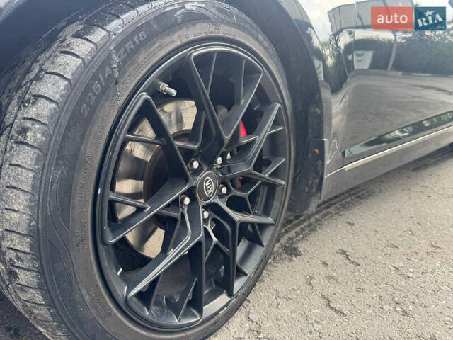 Черный Киа Оптима, объемом двигателя 2 л и пробегом 280 тыс. км за 9750 $, фото 3 на Automoto.ua