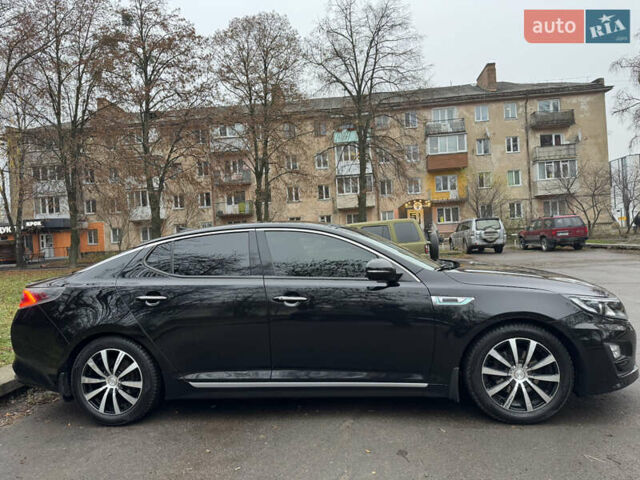 Чорний Кіа Оптіма, об'ємом двигуна 2.36 л та пробігом 168 тис. км за 10999 $, фото 9 на Automoto.ua