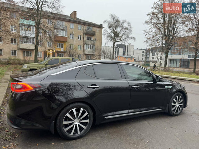 Чорний Кіа Оптіма, об'ємом двигуна 2.36 л та пробігом 168 тис. км за 10999 $, фото 8 на Automoto.ua