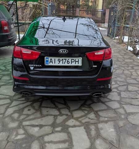 Черный Киа Оптима, объемом двигателя 2.36 л и пробегом 190 тыс. км за 11000 $, фото 11 на Automoto.ua