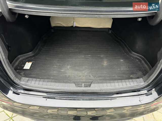 Черный Киа Оптима, объемом двигателя 2.36 л и пробегом 130 тыс. км за 11000 $, фото 16 на Automoto.ua