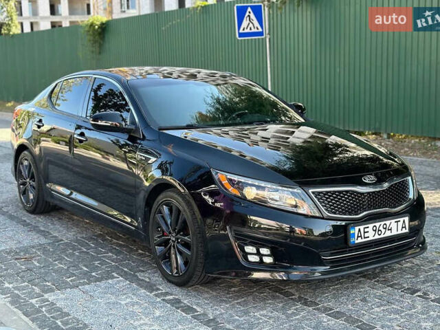 Черный Киа Оптима, объемом двигателя 2 л и пробегом 154 тыс. км за 13700 $, фото 2 на Automoto.ua
