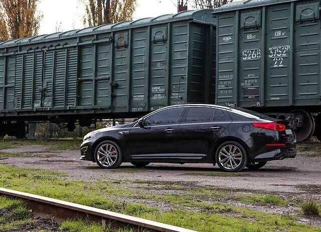 Черный Киа Оптима, объемом двигателя 2 л и пробегом 74 тыс. км за 5800 $, фото 3 на Automoto.ua