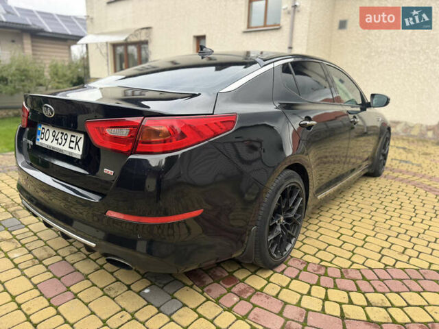 Чорний Кіа Оптіма, об'ємом двигуна 2 л та пробігом 280 тис. км за 9890 $, фото 2 на Automoto.ua