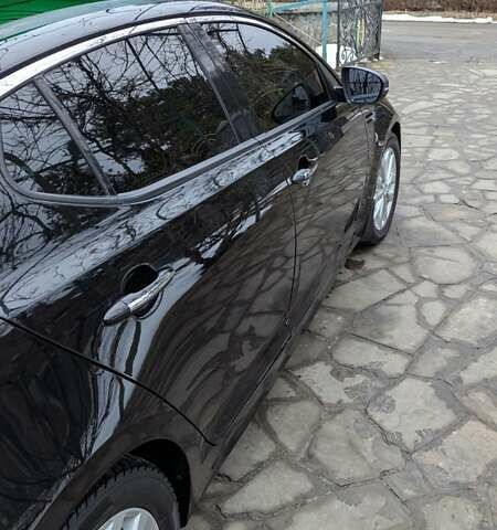 Черный Киа Оптима, объемом двигателя 2.36 л и пробегом 190 тыс. км за 11000 $, фото 9 на Automoto.ua
