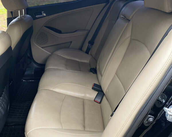 Чорний Кіа Оптіма, об'ємом двигуна 2.4 л та пробігом 208 тис. км за 9300 $, фото 3 на Automoto.ua