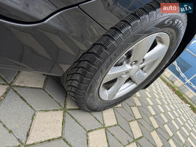 Черный Киа Оптима, объемом двигателя 2.36 л и пробегом 130 тыс. км за 11000 $, фото 14 на Automoto.ua