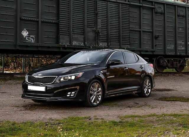Черный Киа Оптима, объемом двигателя 2 л и пробегом 74 тыс. км за 5800 $, фото 2 на Automoto.ua
