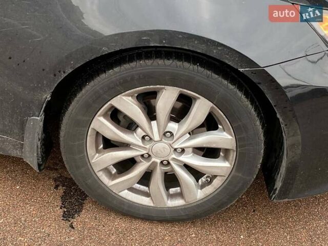 Черный Киа Оптима, объемом двигателя 2.4 л и пробегом 193 тыс. км за 8999 $, фото 18 на Automoto.ua