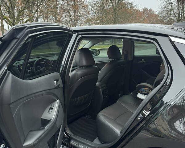 Чорний Кіа Оптіма, об'ємом двигуна 2.36 л та пробігом 168 тис. км за 10999 $, фото 20 на Automoto.ua