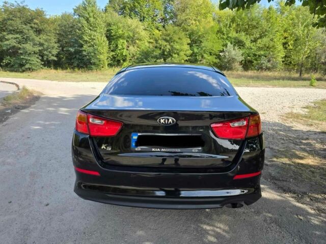 Чорний Кіа Оптіма, об'ємом двигуна 2 л та пробігом 202 тис. км за 7500 $, фото 5 на Automoto.ua
