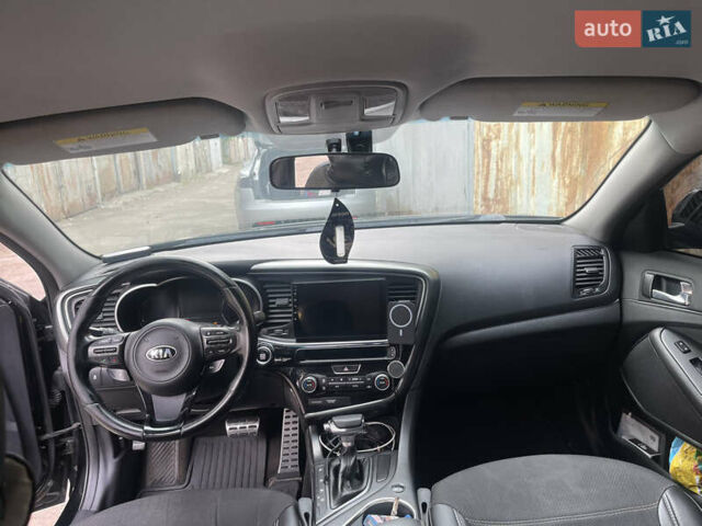 Черный Киа Оптима, объемом двигателя 2.36 л и пробегом 200 тыс. км за 9000 $, фото 6 на Automoto.ua