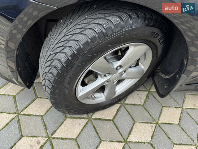 Черный Киа Оптима, объемом двигателя 2.36 л и пробегом 130 тыс. км за 11000 $, фото 13 на Automoto.ua