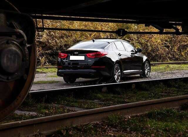 Черный Киа Оптима, объемом двигателя 2 л и пробегом 74 тыс. км за 5800 $, фото 4 на Automoto.ua