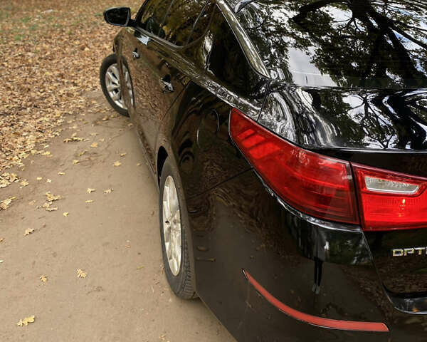 Чорний Кіа Оптіма, об'ємом двигуна 2.4 л та пробігом 208 тис. км за 9300 $, фото 13 на Automoto.ua