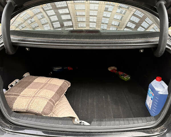 Черный Киа Оптима, объемом двигателя 2.4 л и пробегом 127 тыс. км за 10600 $, фото 11 на Automoto.ua