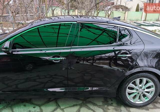 Черный Киа Оптима, объемом двигателя 2.36 л и пробегом 190 тыс. км за 11000 $, фото 14 на Automoto.ua
