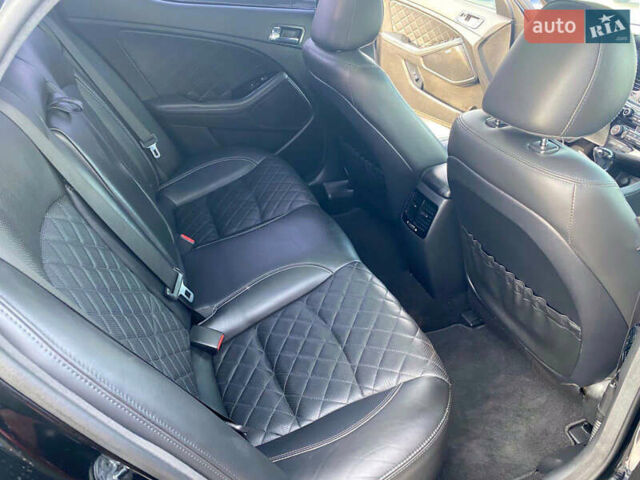 Черный Киа Оптима, объемом двигателя 2 л и пробегом 154 тыс. км за 13700 $, фото 10 на Automoto.ua