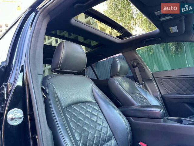 Черный Киа Оптима, объемом двигателя 2 л и пробегом 154 тыс. км за 13700 $, фото 8 на Automoto.ua