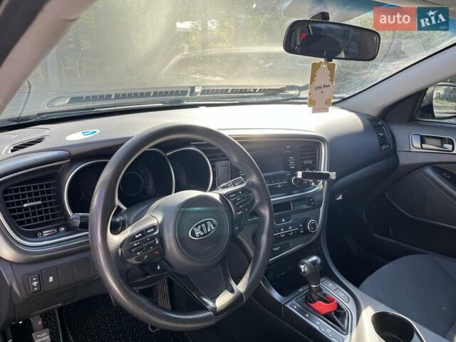 Черный Киа Оптима, объемом двигателя 2.36 л и пробегом 178 тыс. км за 7500 $, фото 8 на Automoto.ua